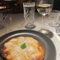 Vegan cheese garlic bread and large glass of wine  at Pizza Express - St Paul's Place in Sheffield
