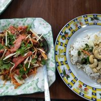 Meat salad on the left and fried cashews with a side of rice to right at Soe Pyi Swar Vegetarian Centre 斋全素食餐室 in Yangon