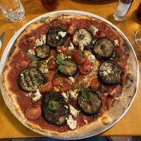 Aubergine, tomato, tofu, mint & pommegranite cream vegan pizza 😍  at Pizza Crocodiles in Innsbruck