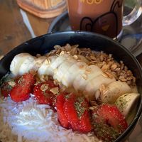 Breakfast bowl and chocolate with water  at Bek Semilla de Vida in San Cristobal De Las Casas