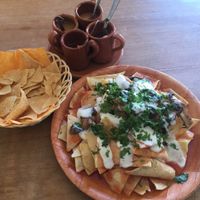 Chilaquiles - so yummy but needs more mushrooms with the dish to be super amazing! at Bek Semilla de Vida in San Cristobal De Las Casas