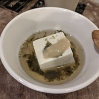 Tofu with miso, in a soup at Tofu Room Dy's in Tokyo