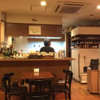 Part of the seating area, viewing the open kitchen at Tofu Room Dy's in Tokyo