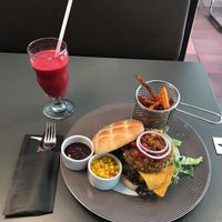 Vegan burger, sweet potatoes, strawberry and raspberry smoothie  at Smeltehuset in Odda