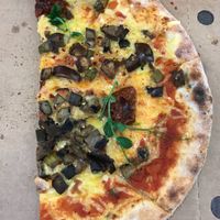 Vegan pizza with nearly no veg and too much sticky cheese.  at Platform Pizza Bar in Bray