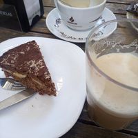 Café con leite de soia e torta de chocolate, avea e plátano. at Cafeteria Reina in Lugo