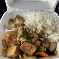Tofu with mixed vegetables and steamed rice  at J J's Wok N Grill in Houghton