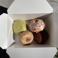 Clockwise from top: matcha, vanilla frosted, Boston creme and maple frosted  at Vegan Donut Gelato in Oakland
