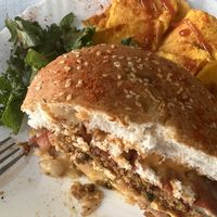 Half the Momi burger with salad and sweet potato chips  at Veggie Momi in Albufeira