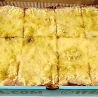 Cheesy garlic pizza at PINZA - Jumeirah Village Circle in Dubai