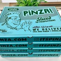 The stack of stylish looking pizzas  at PINZA - Jumeirah Village Circle in Dubai