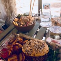 Kale, fried tofu with peanut butter buddah bowl and jackfruit burger at The Burger Cafe in Tenerife