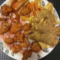 Salt n pepper chick in, sweet n sour sauce, satay  at New Happy Palace  in Gillingham