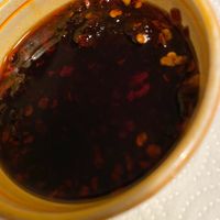 They now do a garlic and chilli oil dip at New Happy Palace  in Gillingham