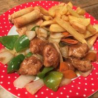 Vegetarian Chicken in Satay Sauce with chips and spring rolls. at New Happy Palace  in Gillingham