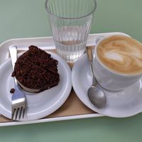 Oat milk coffee with espresso cake at Barbarella Juicebar in Ljubljana