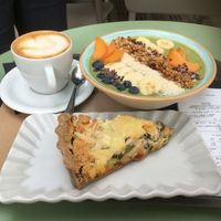 Matcha smoothie bowl, quiche, coffee at Barbarella Juicebar in Ljubljana