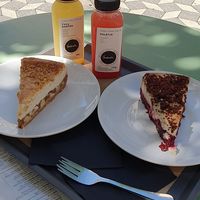 Pieces of cakes and fresh juices at Barbarella Juicebar in Ljubljana