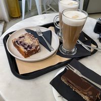 Blueberry and lemon loaf, twix slice, dirty chai lattes  at Barbarella Juicebar in Ljubljana