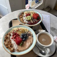 Açai and Peanut protein smoothie bowls, barley latte.  at Barbarella Juicebar in Ljubljana