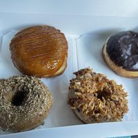 Vegan creme brûlée, boston cream, coffee pecan & maple coconut donuts! All very, very good! #Veganuary at Devi's Donuts and Sweets in Long Beach