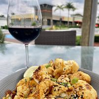 Cauliflower wings in a delicious kung pao sauce at Harvest Seasonal Grill & Wine Bar in Delray Beach