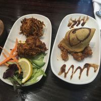 Vegan samosa and vegan onion starter  at Madha in Glasgow
