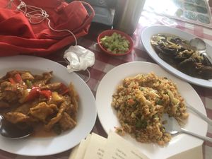 Fried rice, crispy pork and sweet and sour chicken  at Happy Buddha in Kuta
