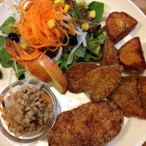 combination plate with fried gluten, potato croquette, potatoes, barley salad and fresh salad at Biotei in Kyoto