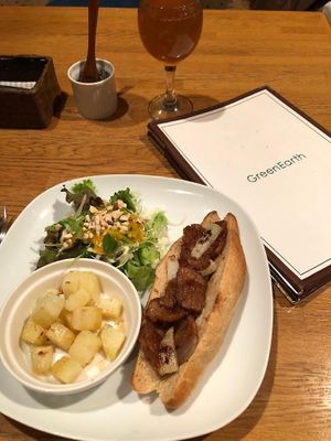 BBQ soy dog with home fries. at Green Earth in Osaka