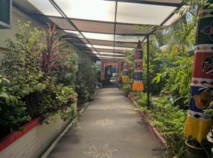 Walkway to the dining area at Annalakshmi Temple of Fine Arts in Penang