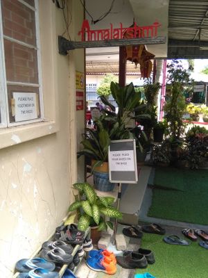 Shoes off policy at Annalakshmi Temple of Fine Arts in Penang
