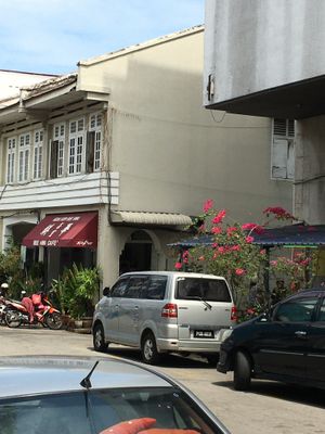 located across from a big blue government building. Just two blocks away from the gateway to Campbell street at Ee Beng Vegetarian Food 毅明素食 in Penang