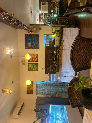 Cosy interior with air con. Very clean. Exterior looks lovely   at Greens in Quezon City