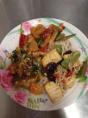 I ordered the pumpkin, mixed veggies with tofu, and sweet&sour veggies all served over a heap of brown rice :) Delicious!  at Youta Jay Vegetarian Food in Ayutthaya