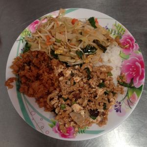 try the sweet crunchy stuff shown on the left! at Youta Jay Vegetarian Food in Ayutthaya