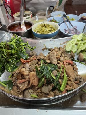 Khao Soi lady selling more   at Chamlong's / The Vegetarian Society Chatuchak in Bangkok