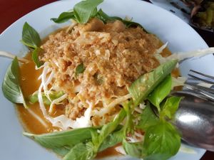 Satay sauce noodles. Fantastic. Must try. Overall raw toppings. Crunchy.  at Chamlong's / The Vegetarian Society Chatuchak in Bangkok