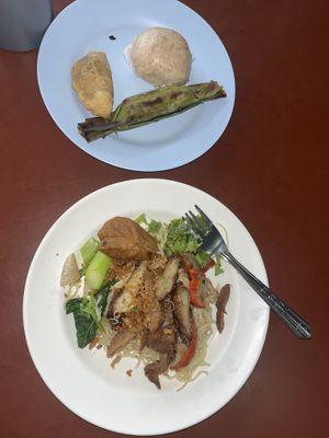 Vegan meat, noodles, banana rice, bao  at Chamlong's / The Vegetarian Society Chatuchak in Bangkok