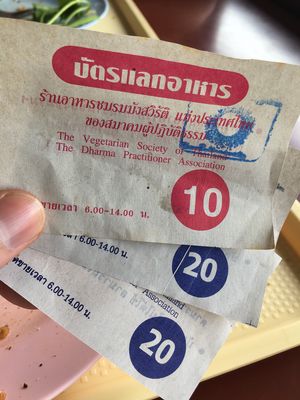 You need to buy there vouchers at the entrance, which you then exchange for the food  at Chamlong's / The Vegetarian Society Chatuchak in Bangkok