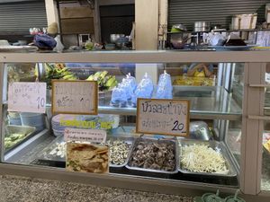 Banana and sweet potato sticky rice and I believe is some herbal soup with mushroom at Chamlong's / The Vegetarian Society Chatuchak in Bangkok