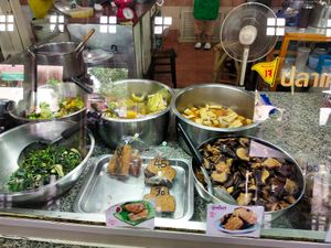Try the mashroms for 60 bhat on the right my fevorit at Chamlong's / The Vegetarian Society Chatuchak in Bangkok