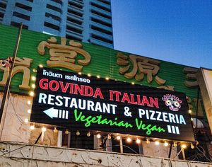 Outdoor signage at Govinda Italian Restaurant & Pizzeria in Bangkok