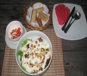 Cesare Salad and included accompaniments 225 baht total. Very nice and good size! at Govinda Italian Restaurant & Pizzeria in Bangkok