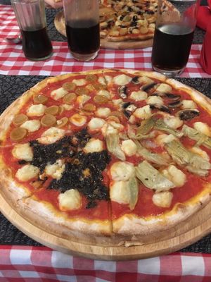 Pizza with vegan cheese  at Govinda Italian Restaurant & Pizzeria in Bangkok