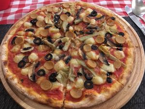 Pizza with vegan cheese  at Govinda Italian Restaurant & Pizzeria in Bangkok