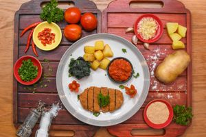 Pollo alla Milanese (Deep fried soy chicken breast) at Govinda Italian Restaurant & Pizzeria in Bangkok