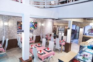 Indoor ground floor at Govinda Italian Restaurant & Pizzeria in Bangkok