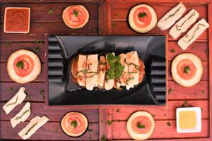 Vegan Melanzane Parmigiana (Baked eggplant, tomato sauce, vegan cheese) at Govinda Italian Restaurant & Pizzeria in Bangkok