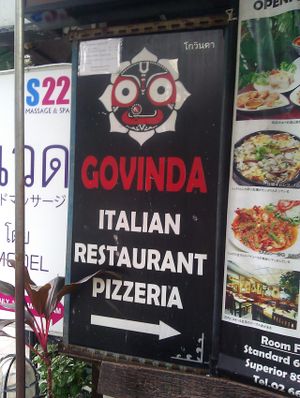 Turn right at this sign on the street ;) at Govinda Italian Restaurant & Pizzeria in Bangkok
